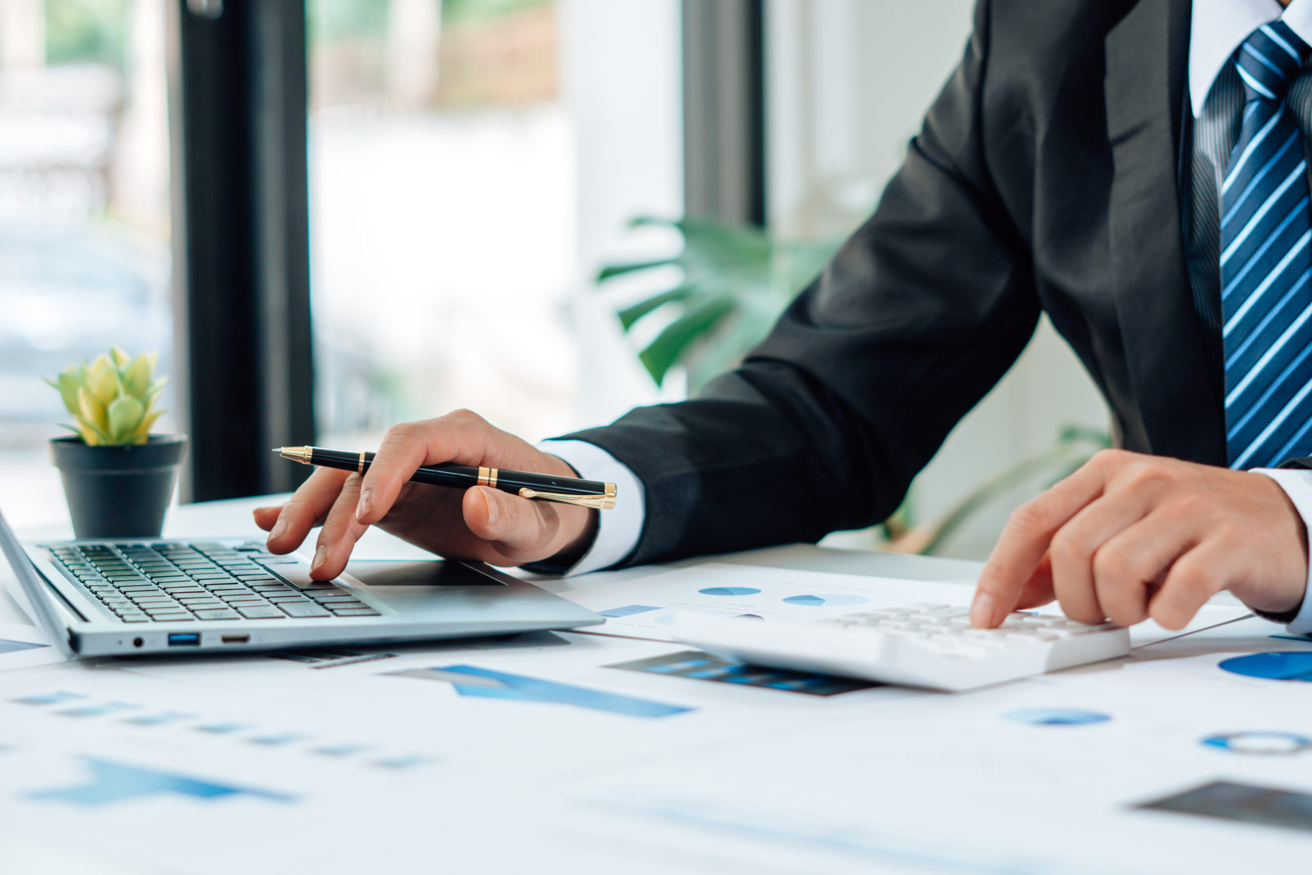 Close up of accountant or banker checking investment results