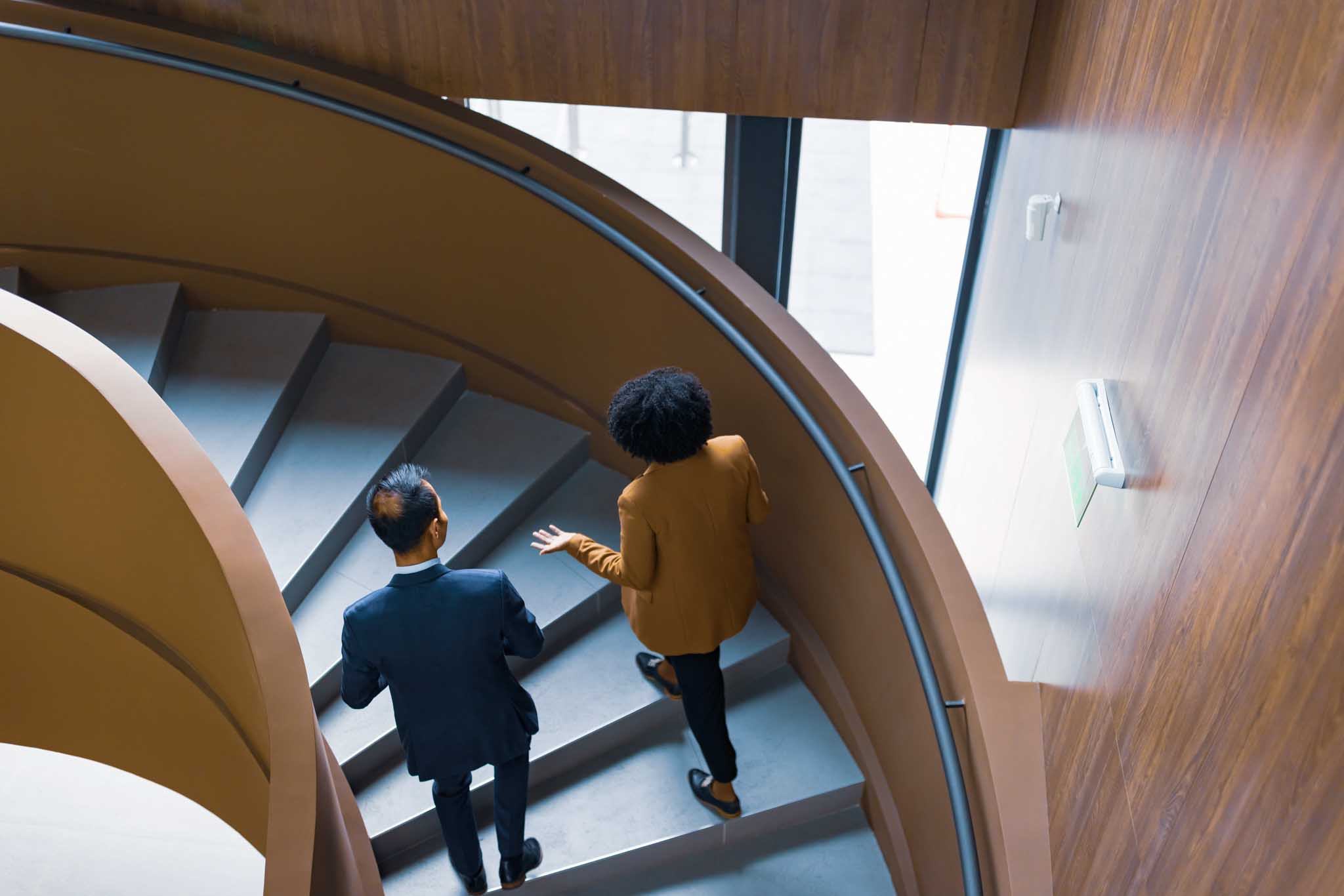 Coworkers-Talking-Stairs